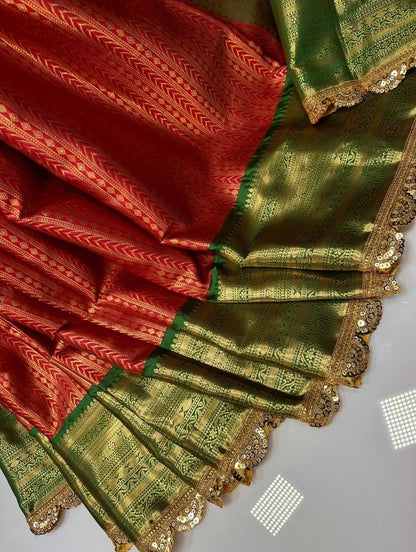 Red with green kanchivaram semi pattu saree with intricate aari lace border