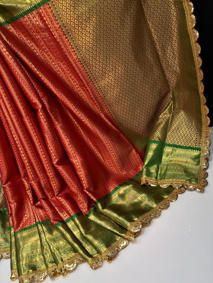 Red with green kanchivaram semi pattu saree with intricate aari lace border