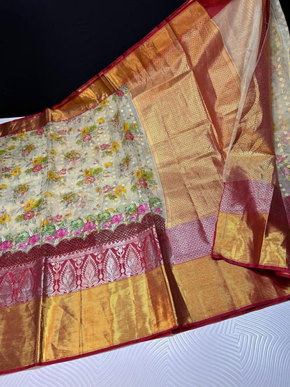 Soft banarasi silk with premium cutwork and embroidery work on the border- Cream with red