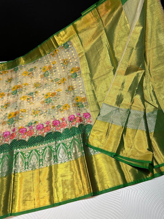 Soft banarasi silk with premium cutwork and embroidery work on the border- Cream with green