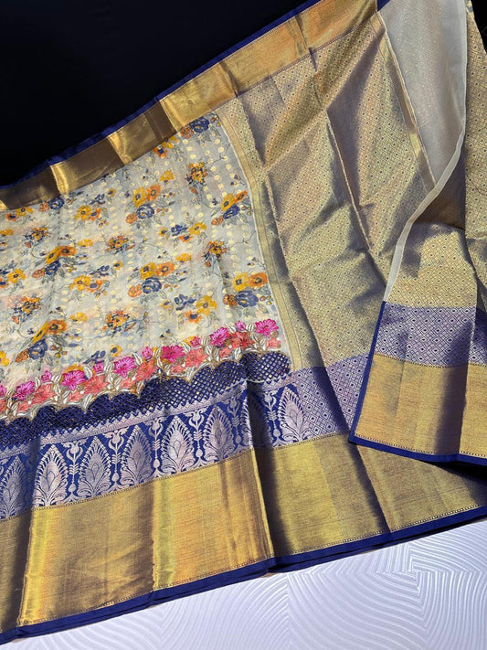 Soft banarasi silk with premium cutwork and embroidery work on the border- Cream with blue